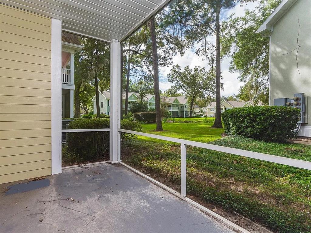 10000 Southwest 52nd Avenue, Unit 99 Gainesville, FL 32608 - Photo 18 of 19 a view of a house with backyard from a tub