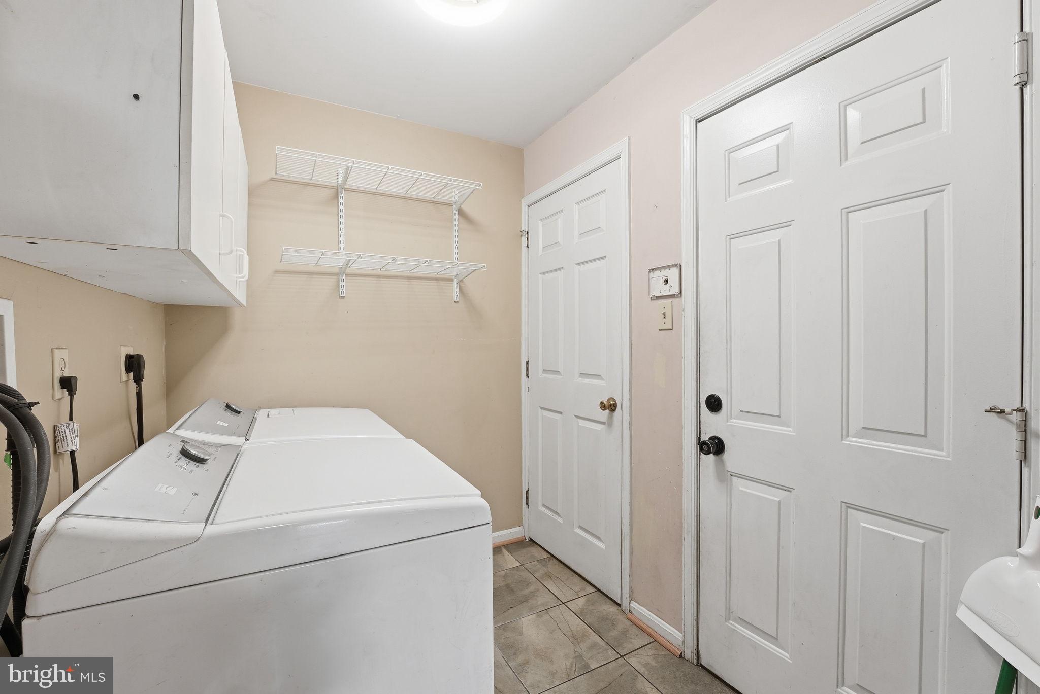 6870 Hawkins Gate Road La Plata, MD 20646 - Photo 18 of 24 a utility room with dryer and washer