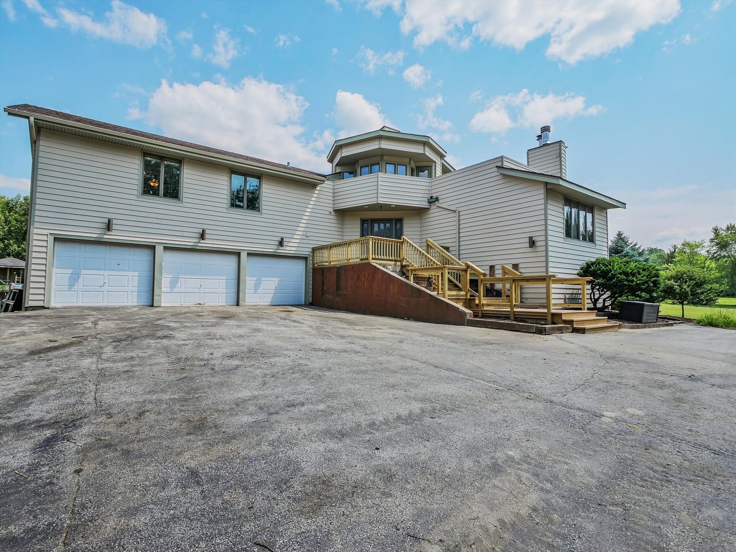 7240 West Colleen Court Monee, IL 60449 - Photo 4 of 57 a front view of a house with a yard