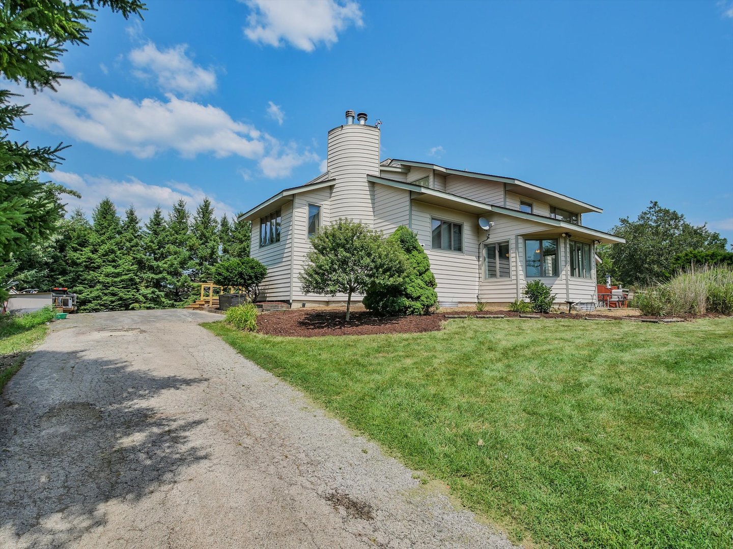 7240 West Colleen Court Monee, IL 60449 - Photo 5 of 57 a front view of a house with a yard