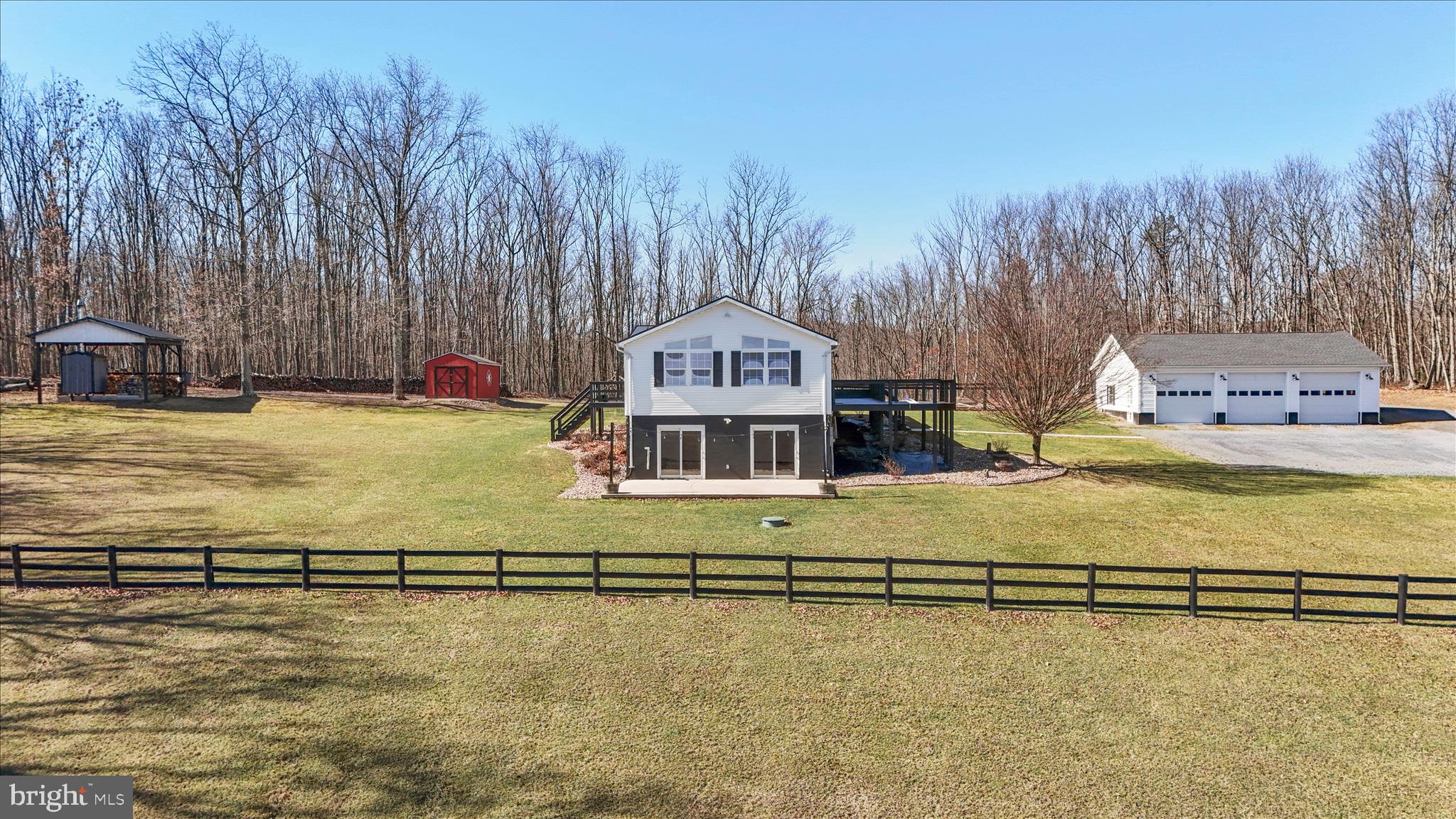 3688 Ash Ruckman Road Augusta, WV 26704 - Photo 59 of 66 a view of a swimming pool with an outdoor space and seating area