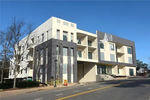 a view of a building and a street