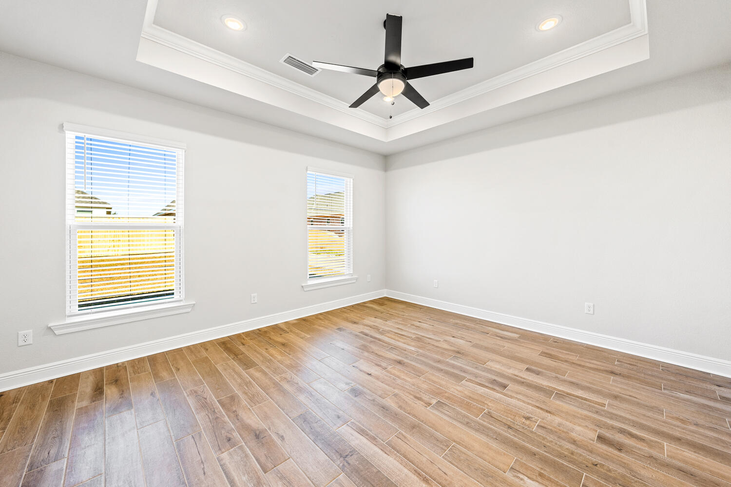 165 Splendor Run Ponce de Leon, FL 32455 - Photo 11 of 24 a view of empty room with wooden floor and fan