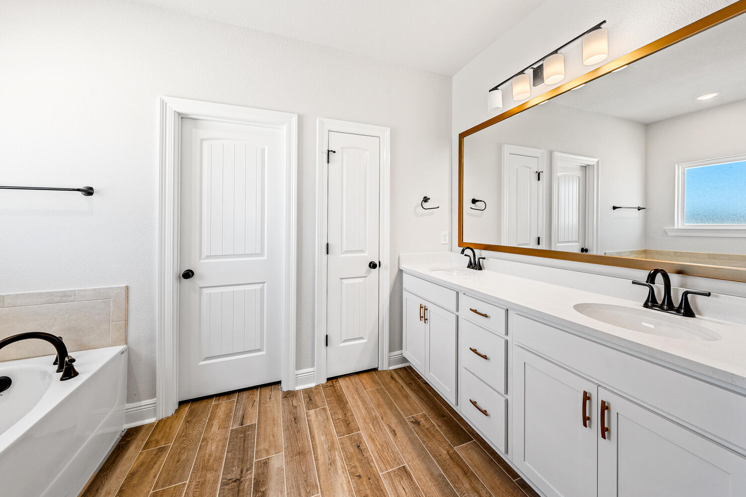165 Splendor Run Ponce de Leon, FL 32455 - Photo 13 of 24 a spacious bathroom with a sink and mirror