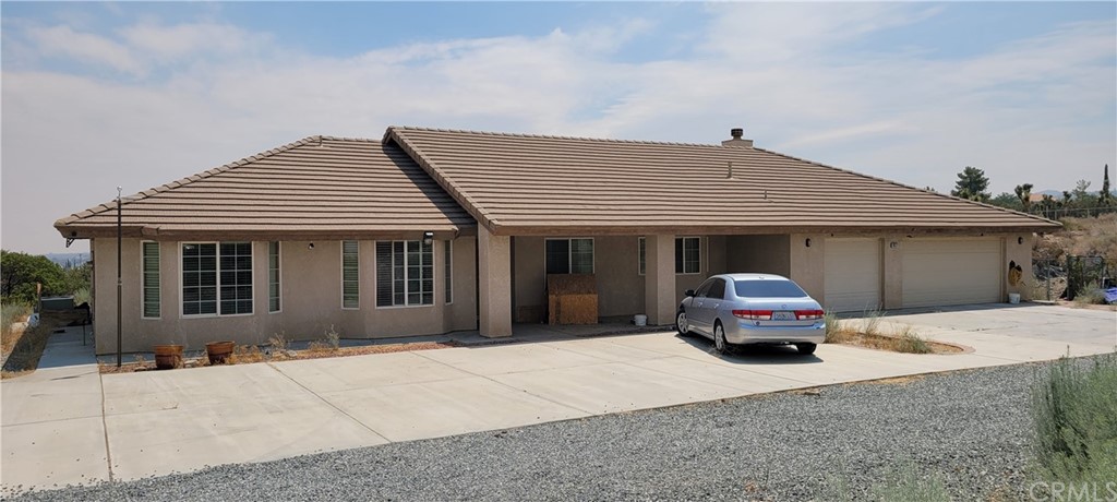 10371 Pineview Road Pinon Hills, CA 92372 - Photo 1 of 1 a house view with a outdoor space
