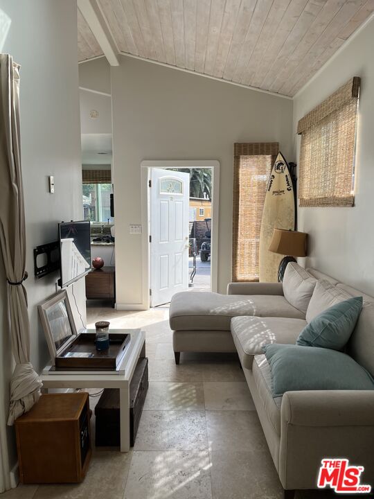 36 Paradise Cove Road Malibu, CA 90265 - Photo 2 of 8 a living room with furniture and a window