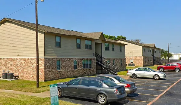 a car parked in front of a house