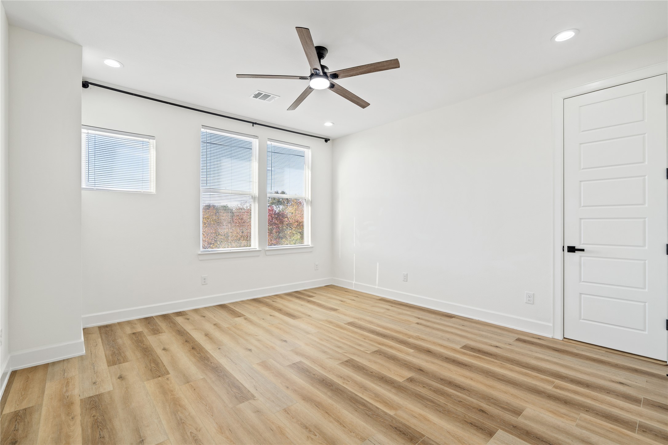 3601 Rebecca Street, Unit A Houston, TX 77021 - Photo 19 of 29 wooden floor in an empty room with a window
