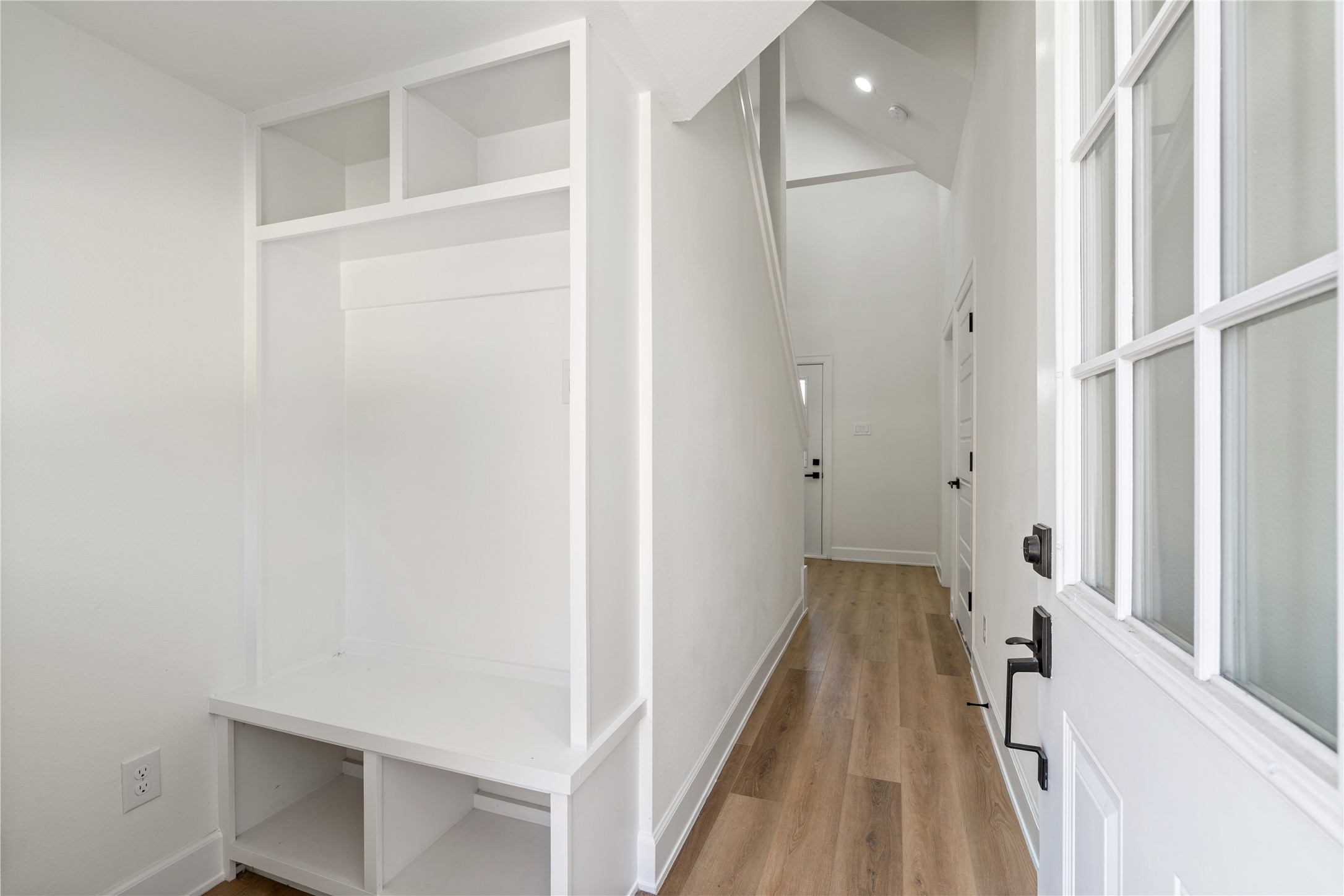 3601 Rebecca Street, Unit A Houston, TX 77021 - Photo 2 of 29 a view of a hallway with wooden floor and staircase