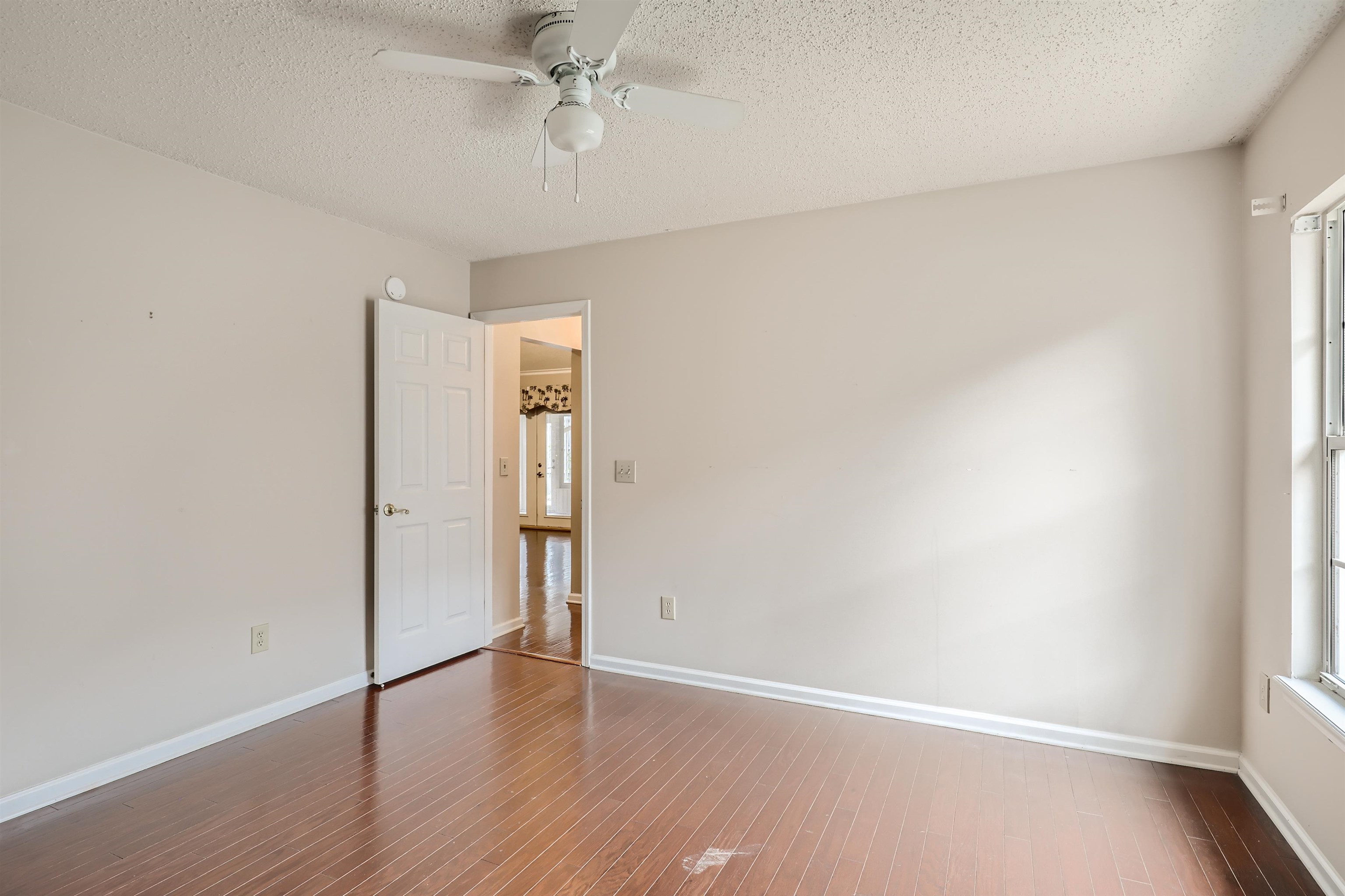 3684 Eagle Ridge Drive Jacksonville, FL 32224 - Photo 26 of 33 a view of an empty room with wooden floor