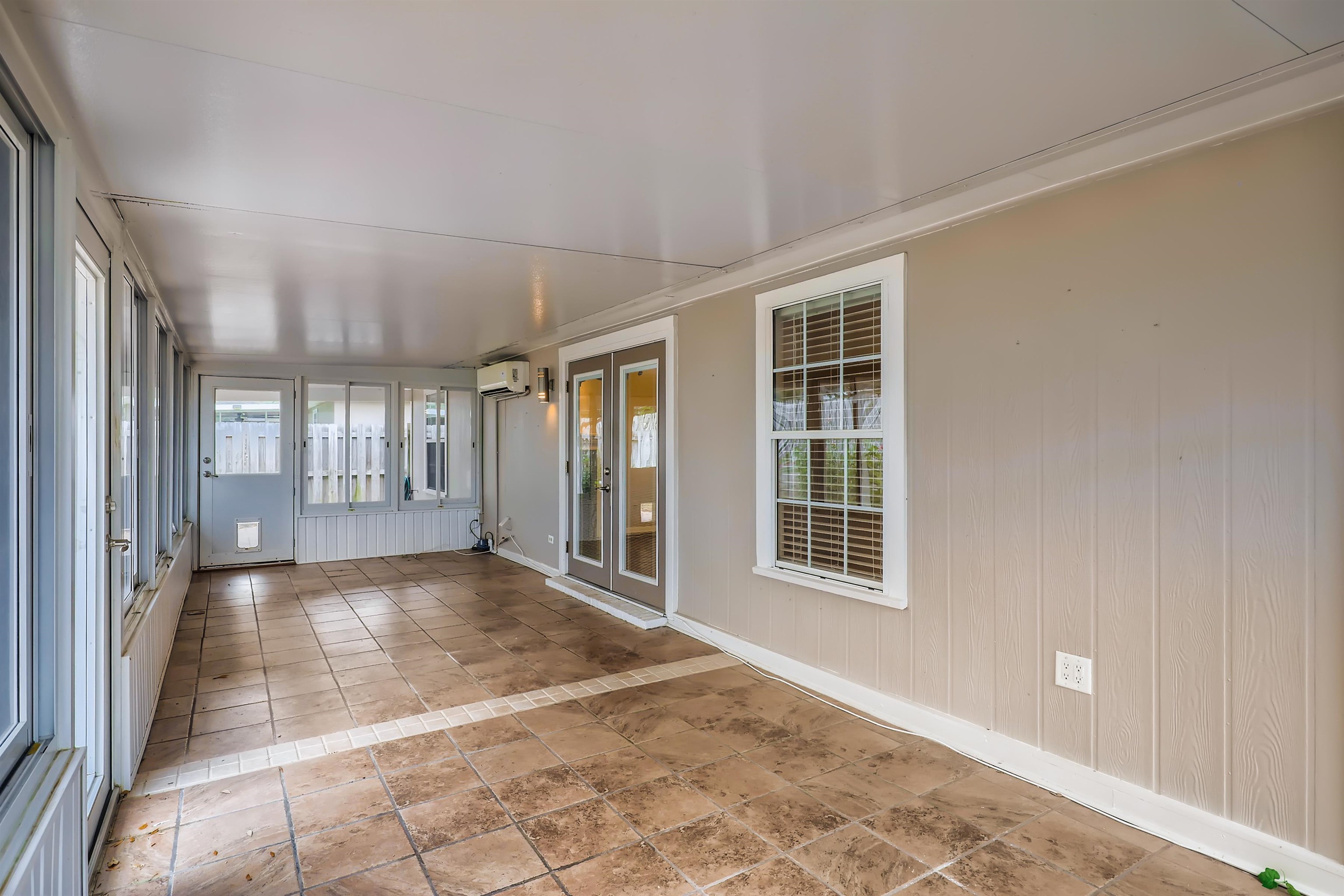 3684 Eagle Ridge Drive Jacksonville, FL 32224 - Photo 28 of 33 a view of a big room with windows and entryway