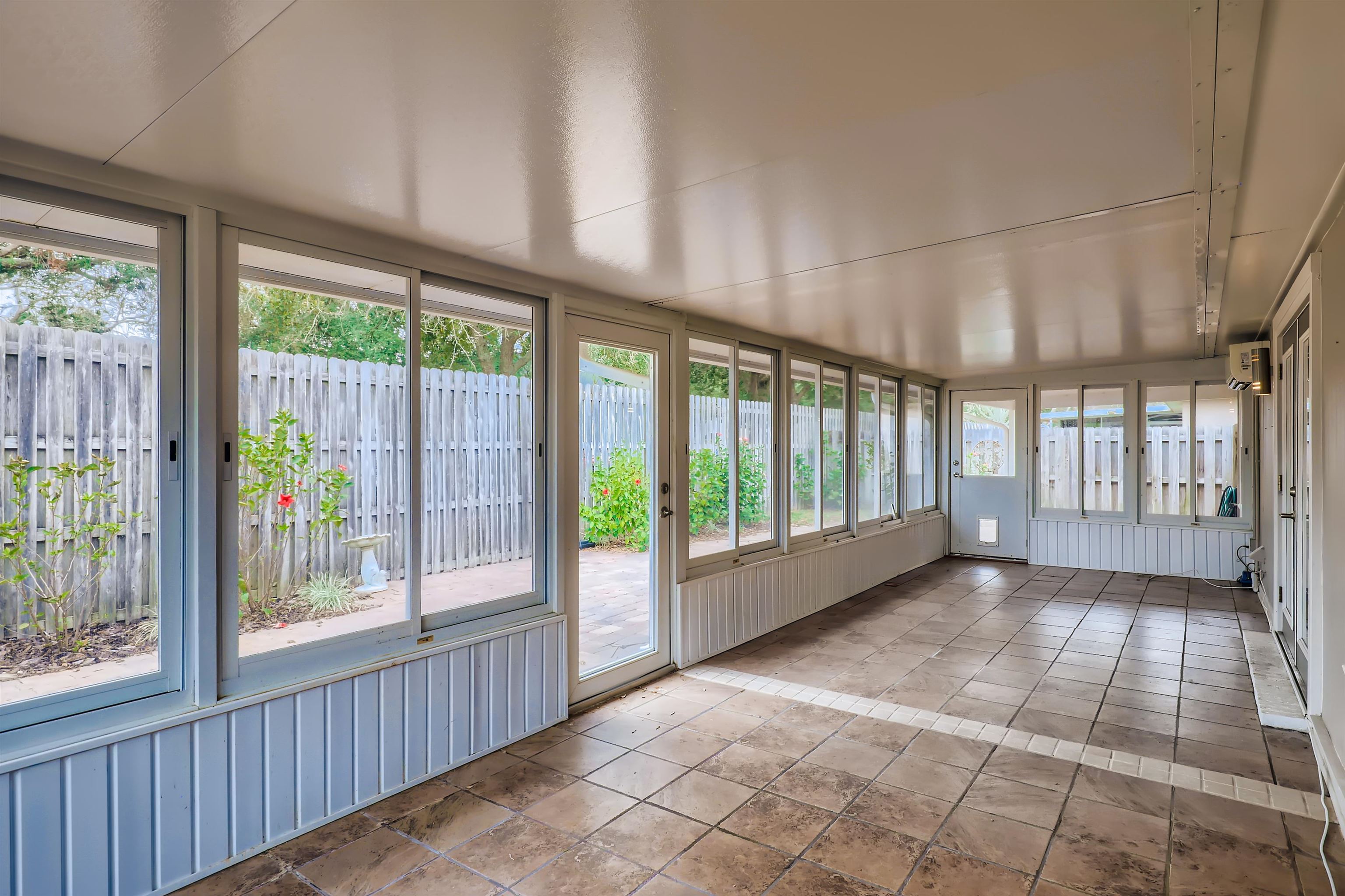 3684 Eagle Ridge Drive Jacksonville, FL 32224 - Photo 29 of 33 a view of a room with large windows