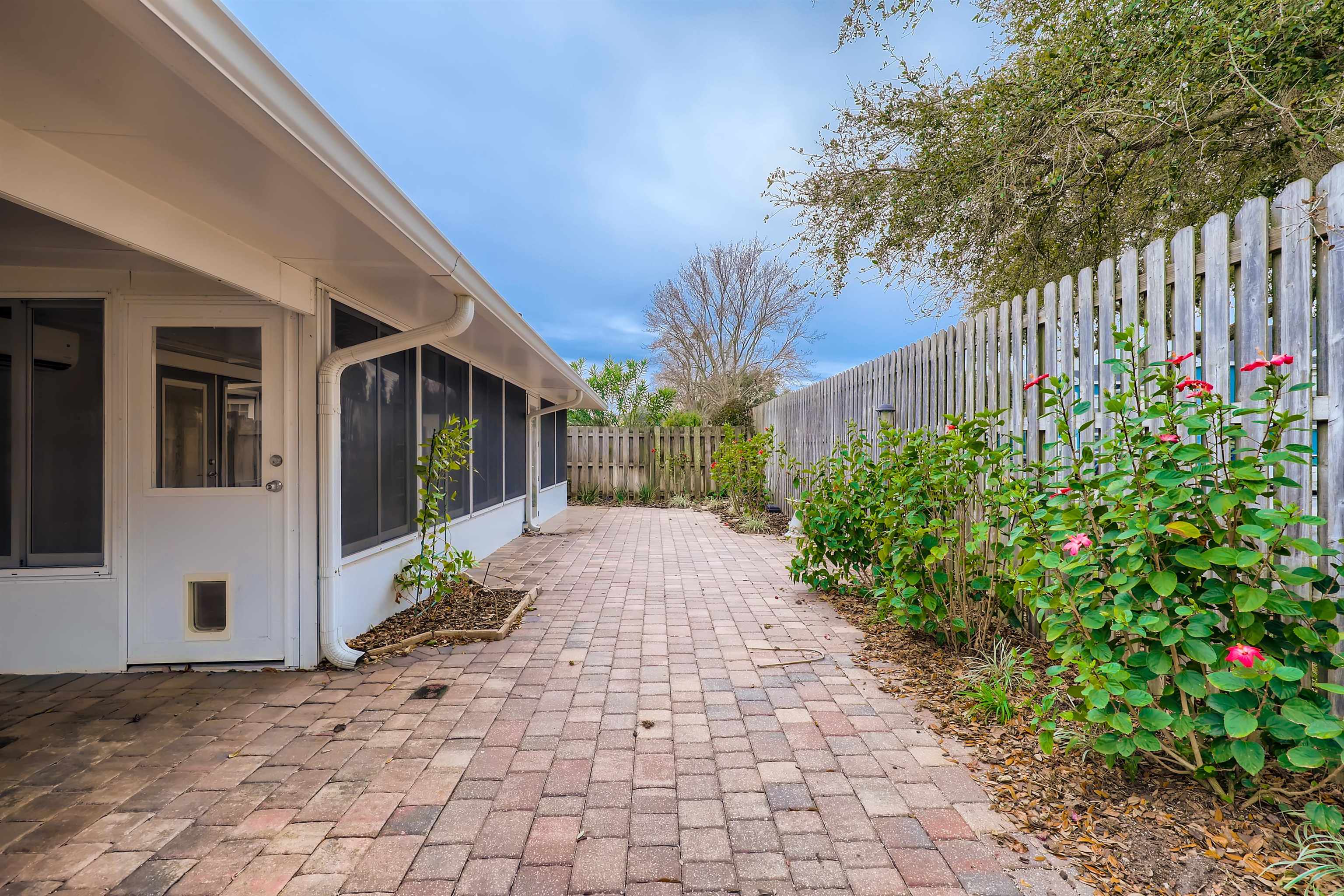 3684 Eagle Ridge Drive Jacksonville, FL 32224 - Photo 32 of 33 a view of a pathway with house and garden
