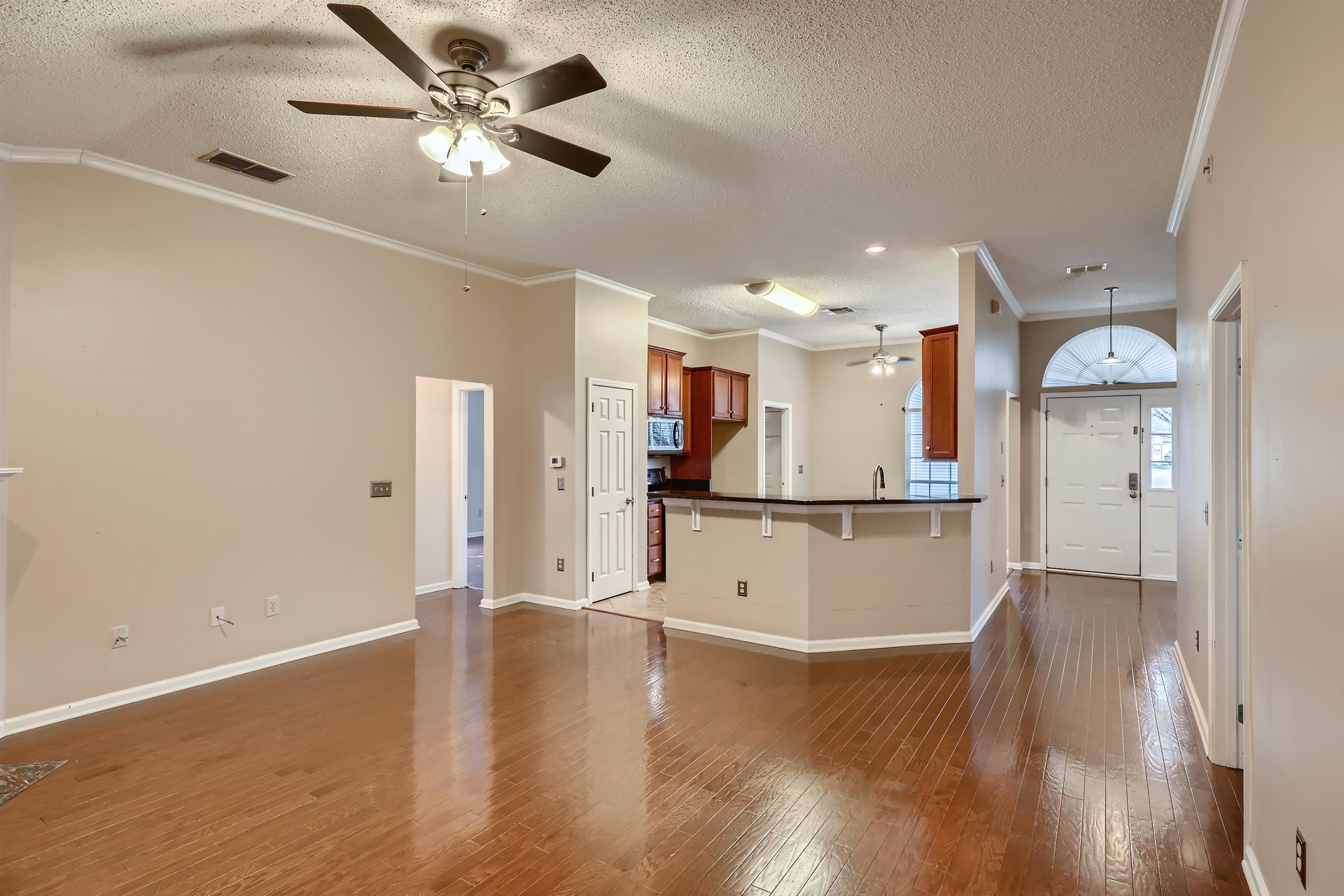 3684 Eagle Ridge Drive Jacksonville, FL 32224 - Photo 7 of 33 a view of kitchen with cabinets and wooden floor
