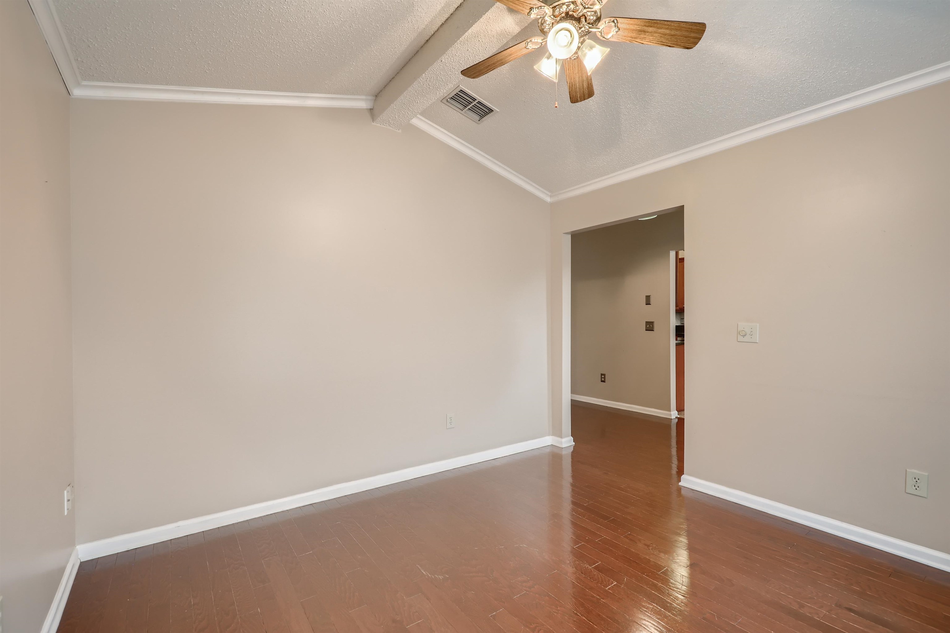 3684 Eagle Ridge Drive Jacksonville, FL 32224 - Photo 9 of 33 a view of an empty room with wooden floor