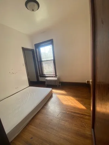 a room with window and furniture