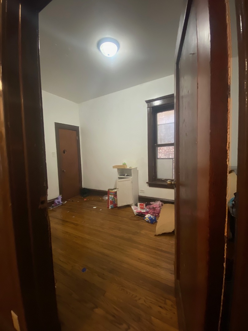 3903 West Monroe Street Chicago, IL 60624 - Photo 7 of 9 a room with window and furniture