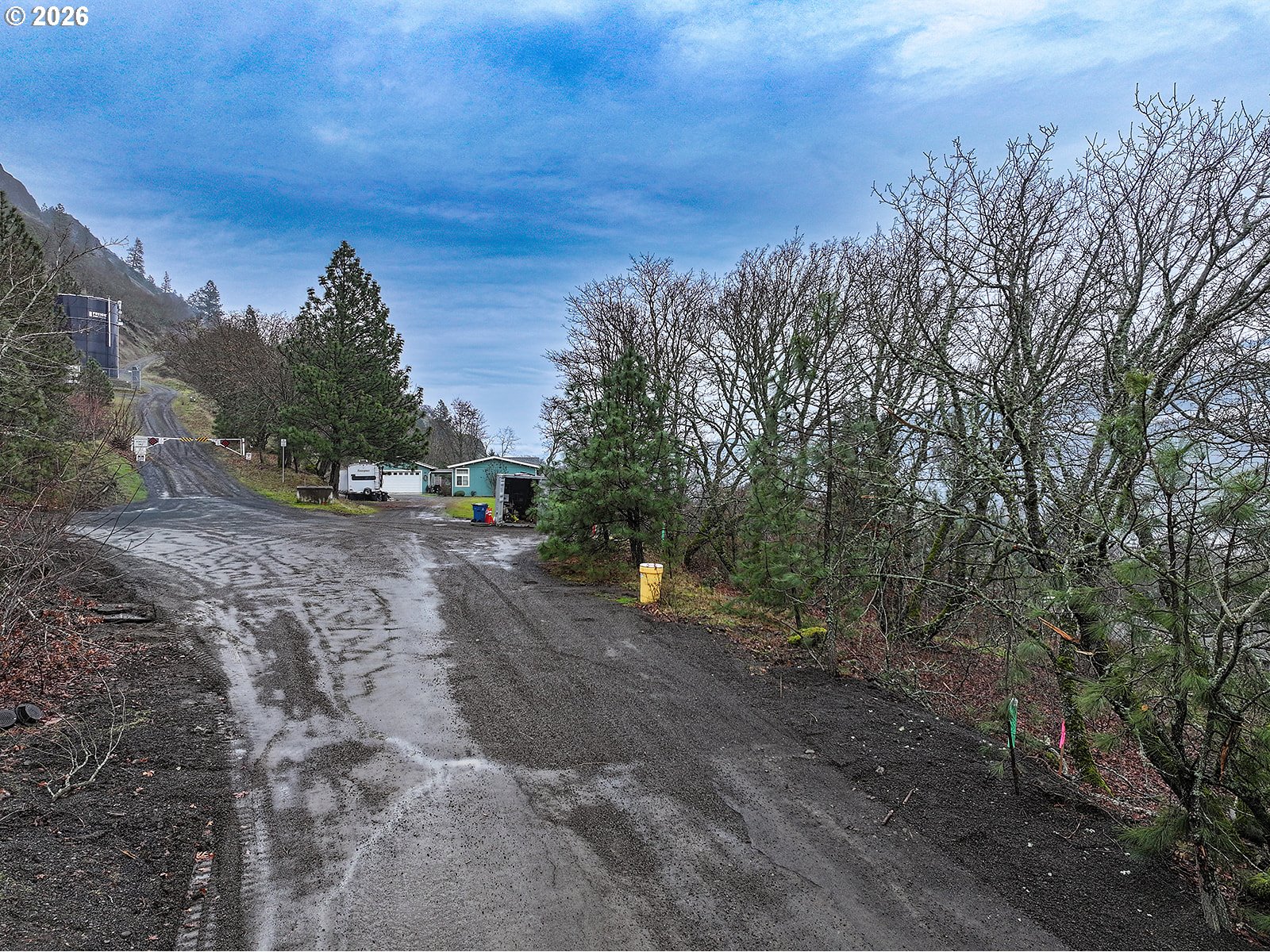 2 East Franklin Street Bingen, WA 98605 - Photo 4 of 16 a view of road with trees in the background