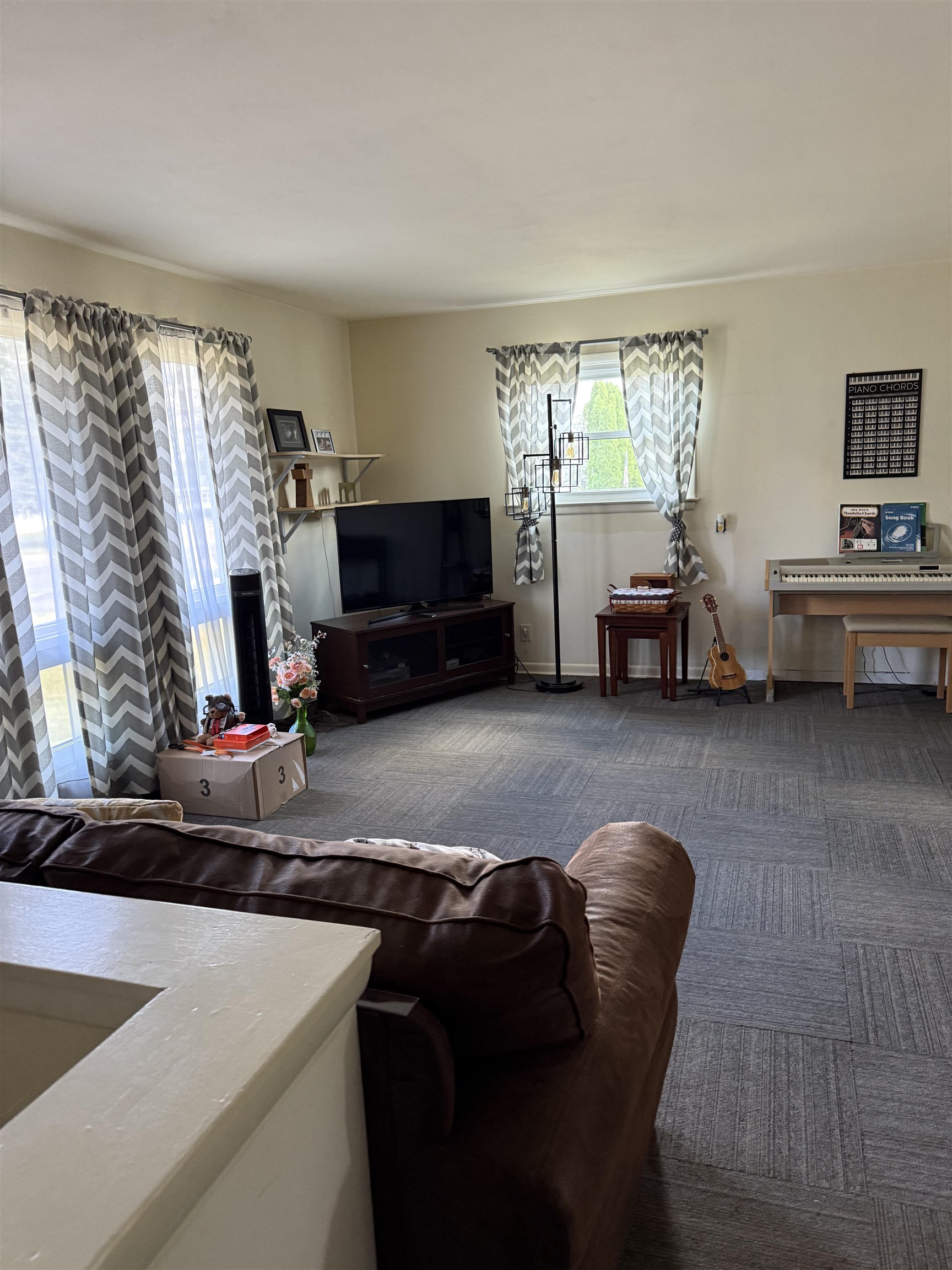 1909 West Laurel Street Freeport, IL 61032 - Photo 17 of 32 a living room with furniture and a flat screen tv