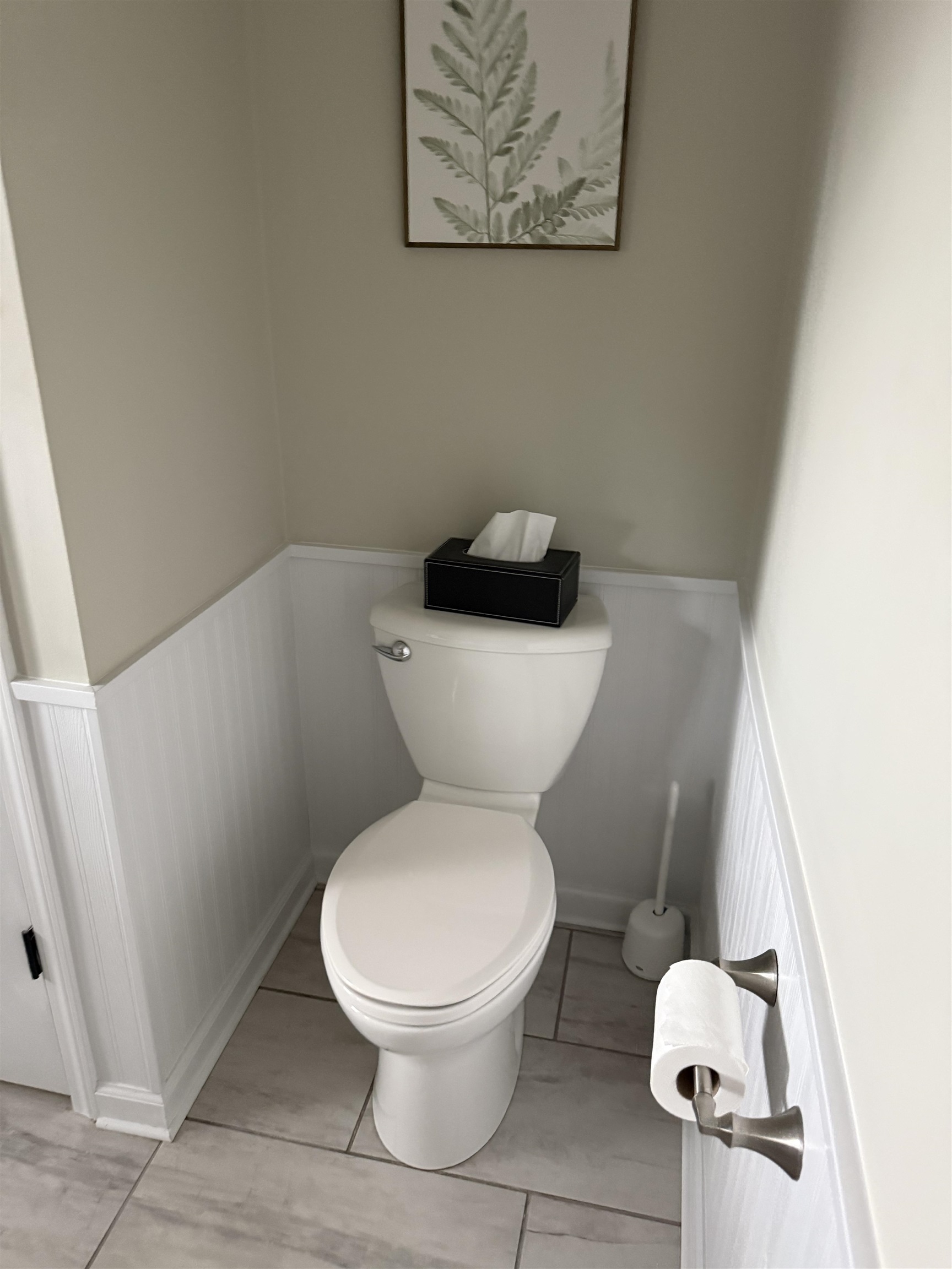 1909 West Laurel Street Freeport, IL 61032 - Photo 23 of 32 a white toilet sitting next to a white wall