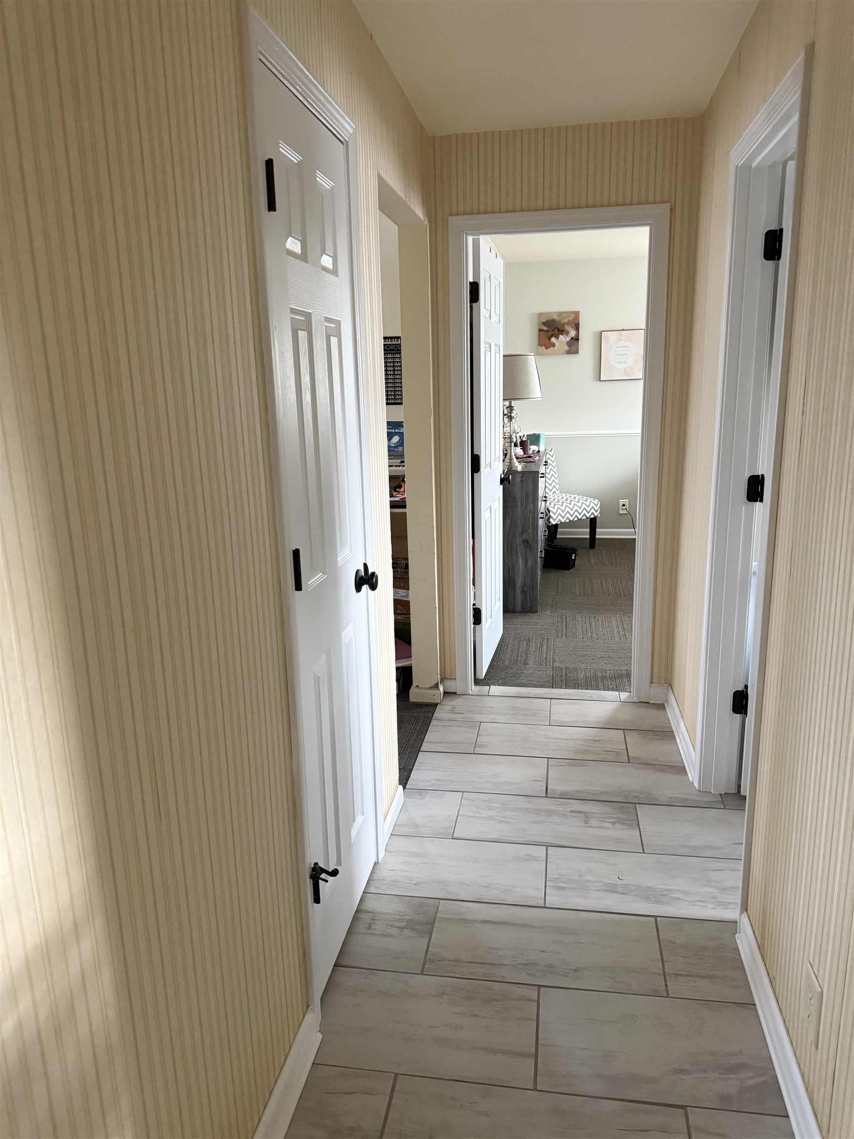 1909 West Laurel Street Freeport, IL 61032 - Photo 24 of 32 a view of a hallway with a livingroom and a bathroom
