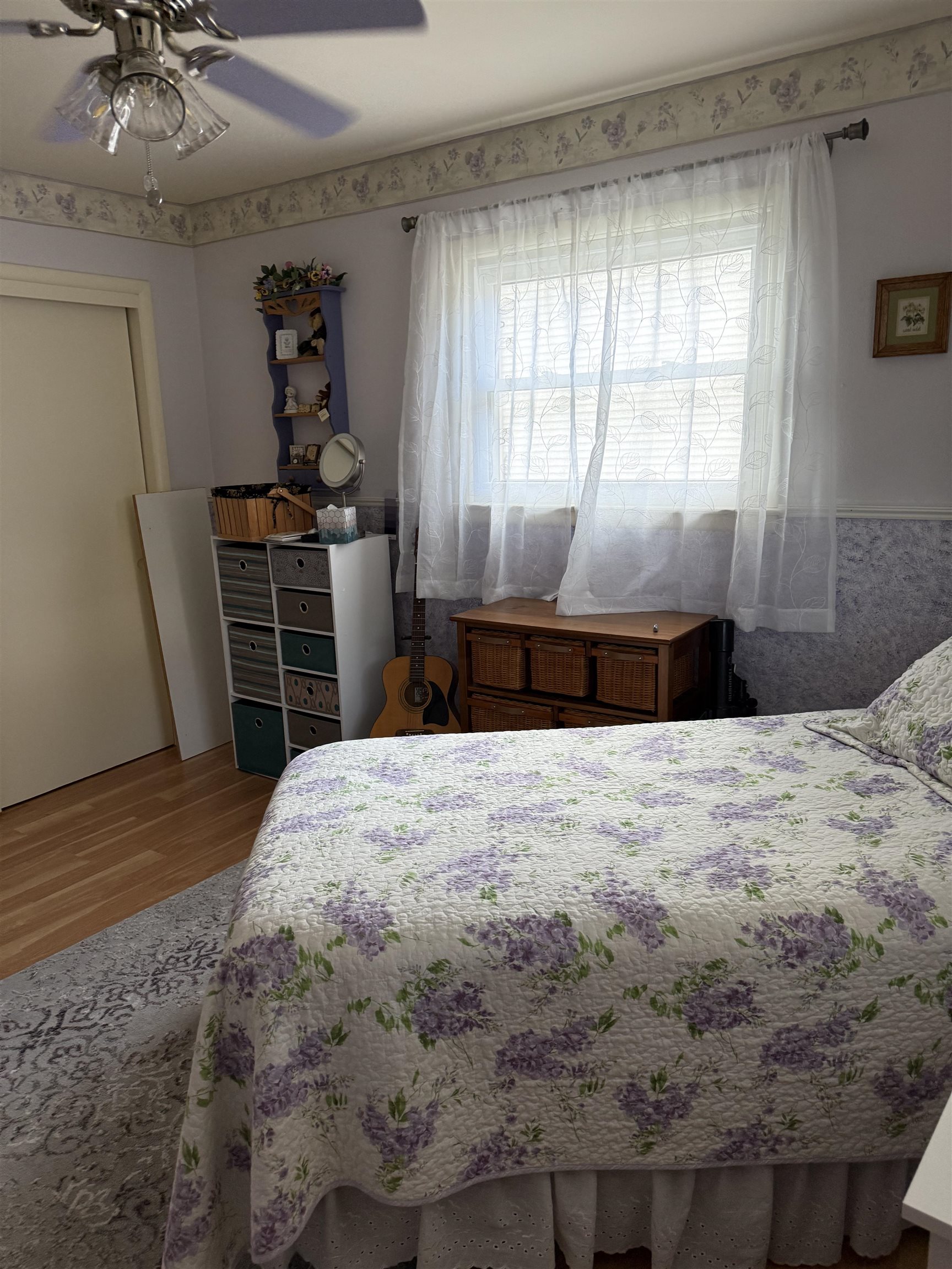 1909 West Laurel Street Freeport, IL 61032 - Photo 25 of 32 a bedroom with a bed and a dresser