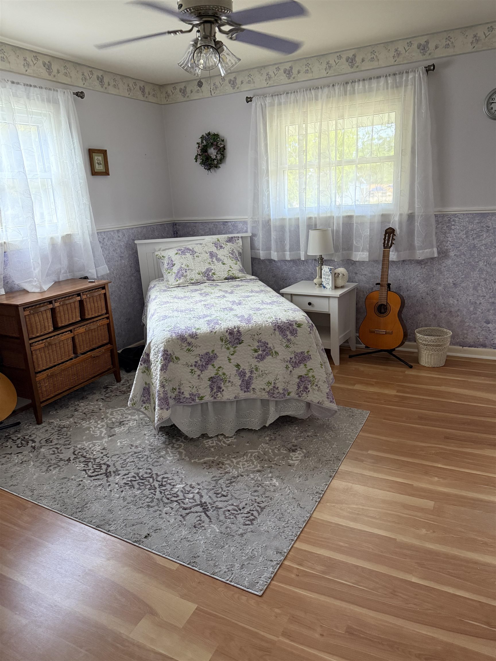 1909 West Laurel Street Freeport, IL 61032 - Photo 26 of 32 a bedroom with a bed and a couch