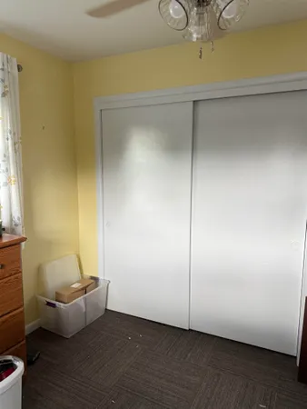 a view of room with wooden floor