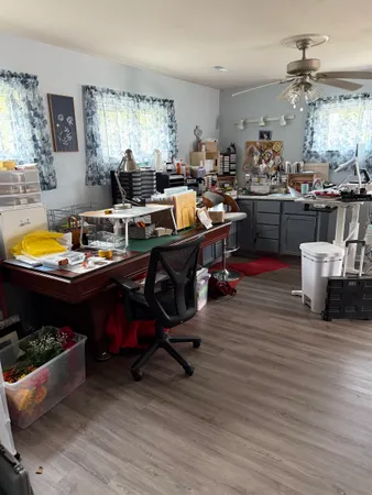 a dining room with furniture and window
