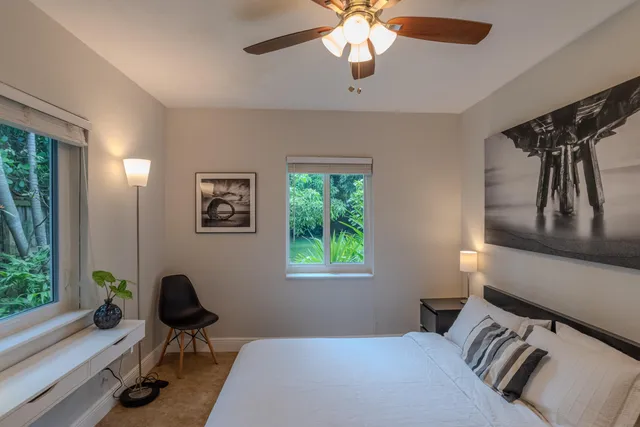 a bathroom with a toilet and a bathtub