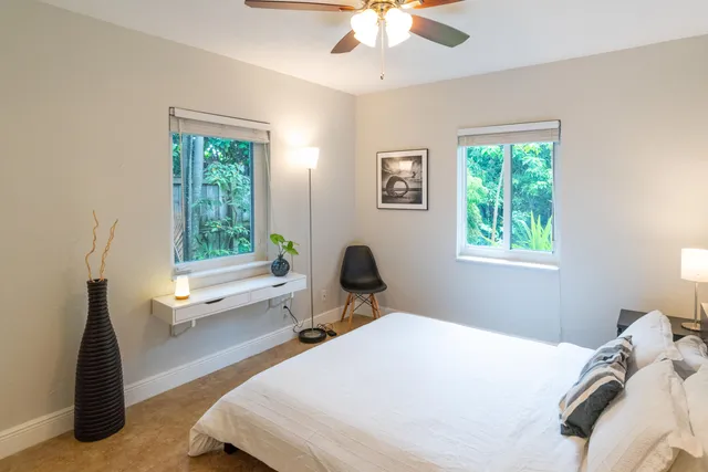 a view of living room with furniture and a flat screen tv