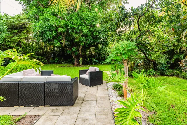 a view of a bench in a garden