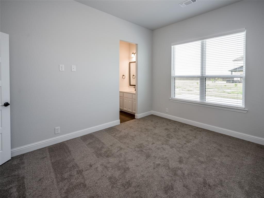 2108 Charters Circle Nevada, TX 75173 - Photo 23 of 37 an empty room with a window