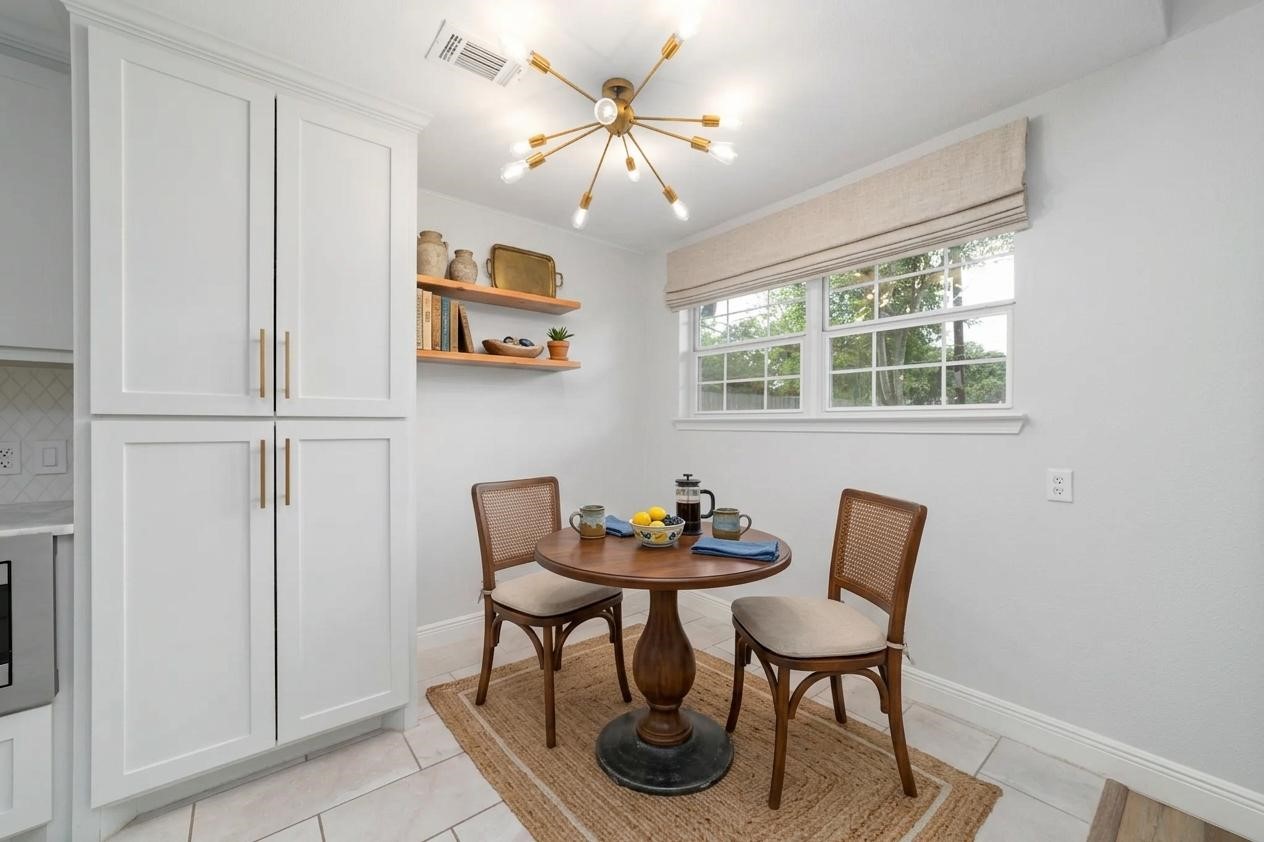 5922 Hummingbird Street Houston, TX 77096 - Photo 12 of 26 Just off the kitchen, the breakfast area offers the perfect place for casual meals, morning coffee, or catching up before the day begins. Sometimes it's the smallest spaces that become your favorites. (VS)