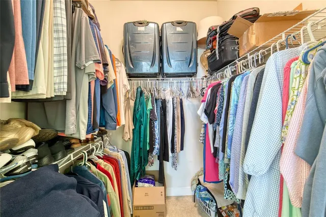 a view of a porch with chairs and backyard