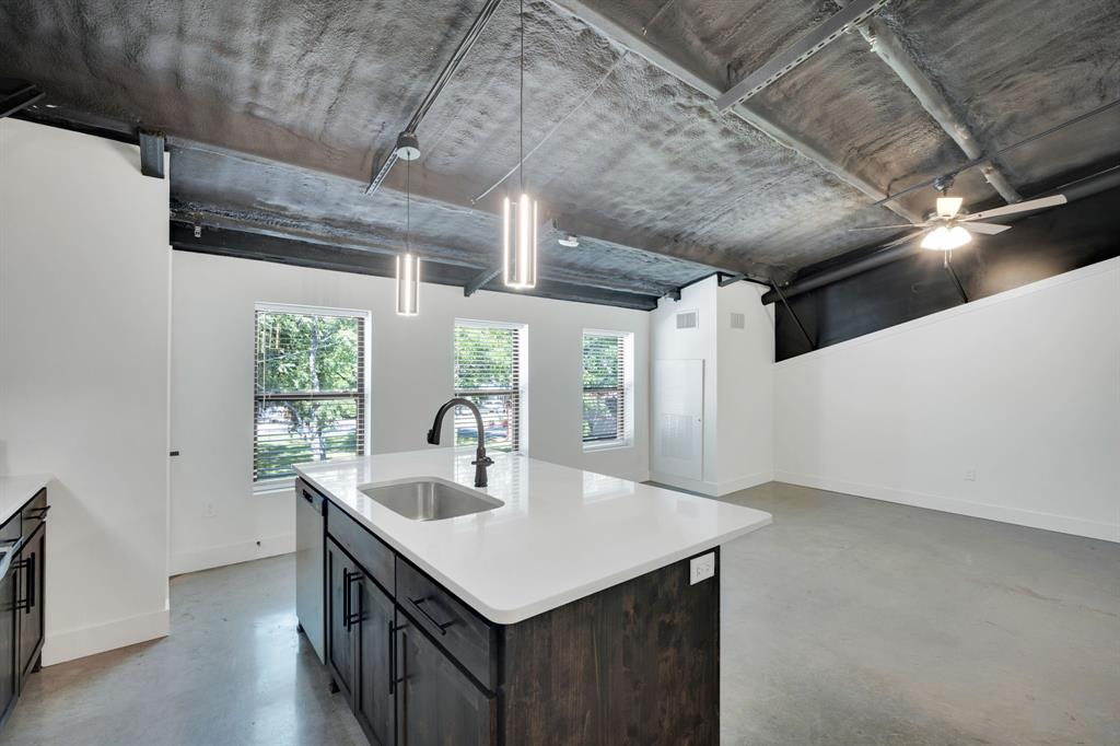 301 West Main Street, Unit 254 Midlothian, TX 76065 - Photo 3 of 18 a kitchen with a sink a counter space and a window