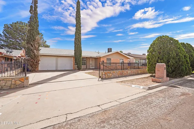 a view of house with a street