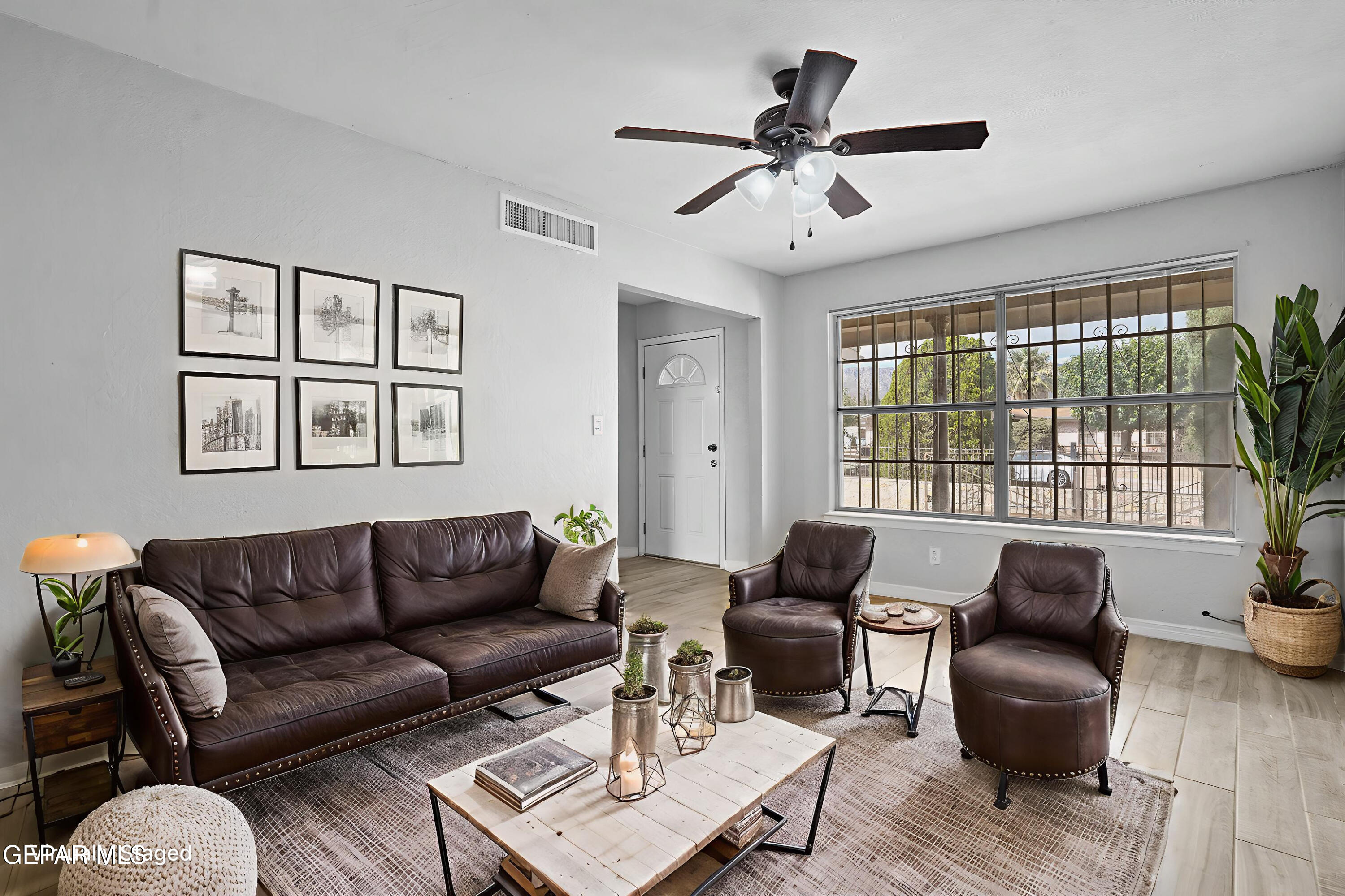 10448 Adonis Drive El Paso, TX 79924 - Photo 3 of 41 living room virtually staged