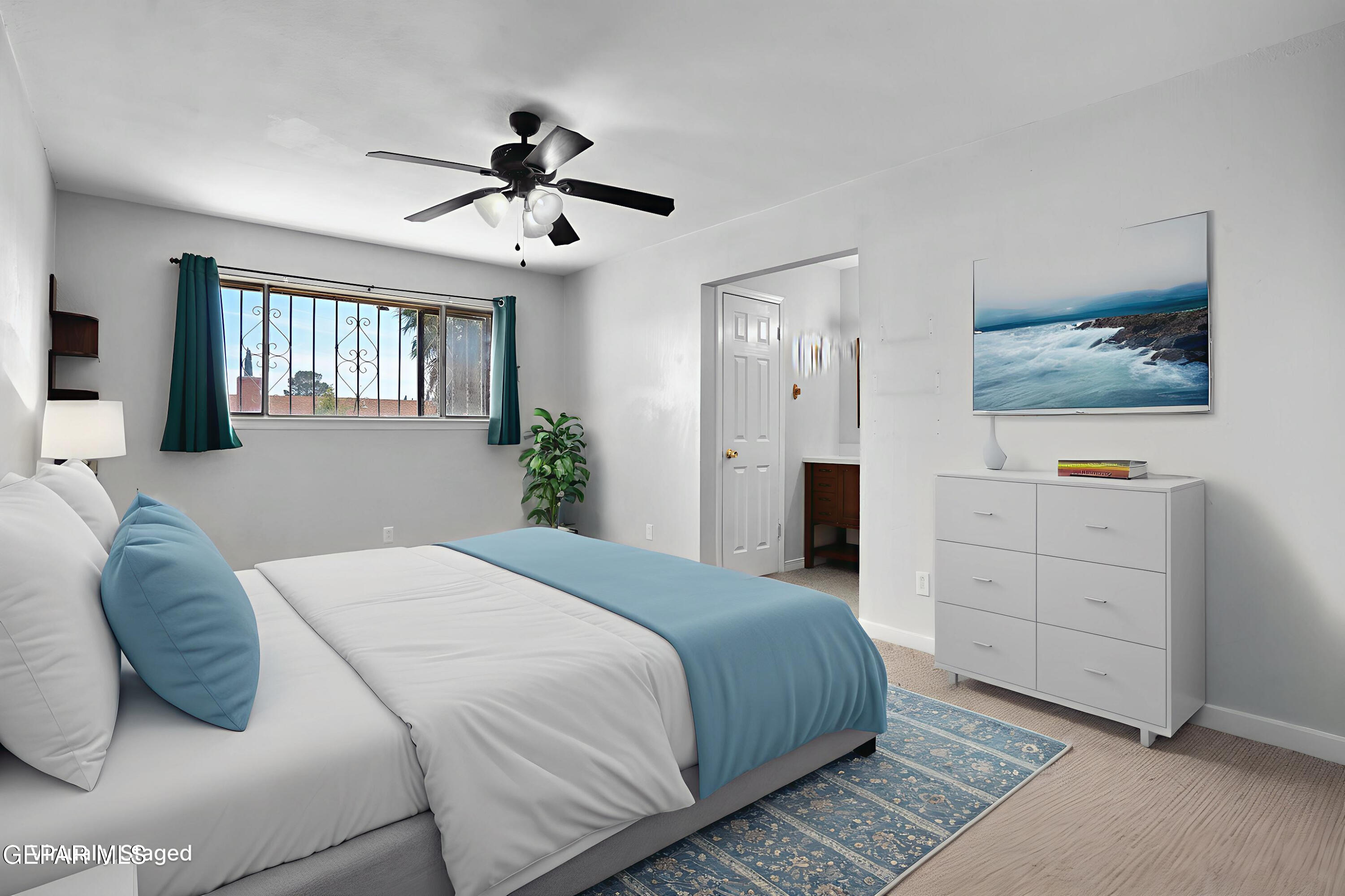 10448 Adonis Drive El Paso, TX 79924 - Photo 6 of 41 primary bedroom virtually staged