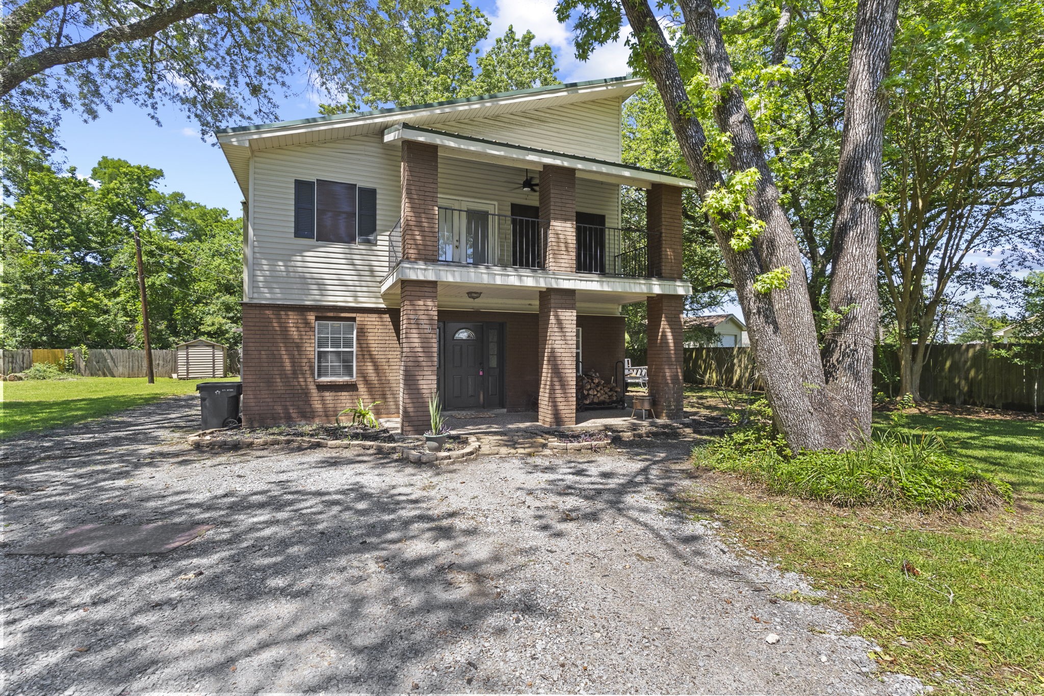 770 Katherene Avenue Bridge City, TX 77611 - Photo 1 of 29 a front view of a house with garden