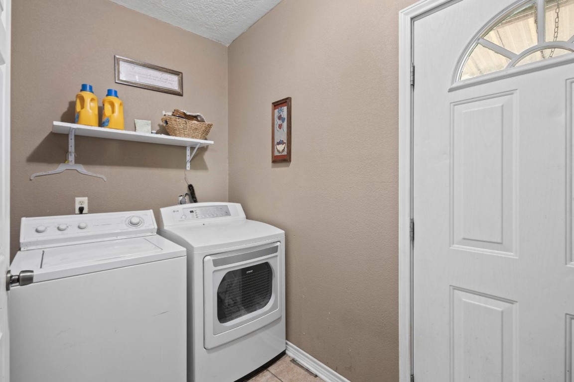 770 Katherene Avenue Bridge City, TX 77611 - Photo 12 of 29 a utility room with dryer and washer