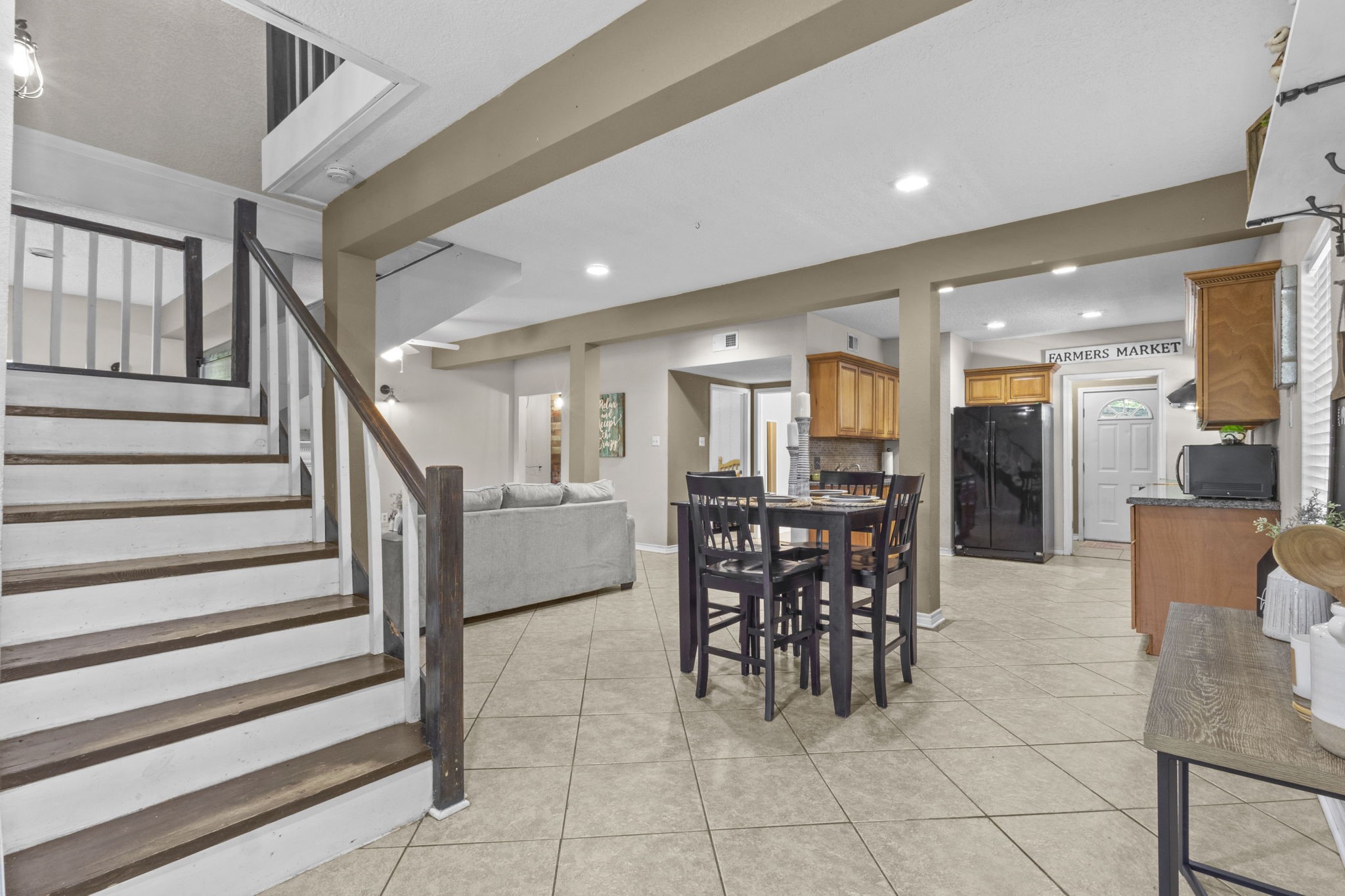 770 Katherene Avenue Bridge City, TX 77611 - Photo 12 of 29 a dining hall with a dining table chairs and view of living room