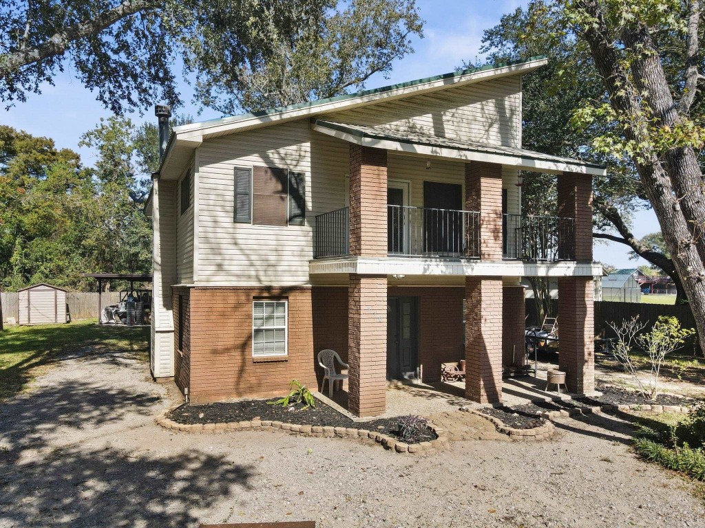 770 Katherene Avenue Bridge City, TX 77611 - Photo 2 of 29 a view of a house with backyard porch and furniture