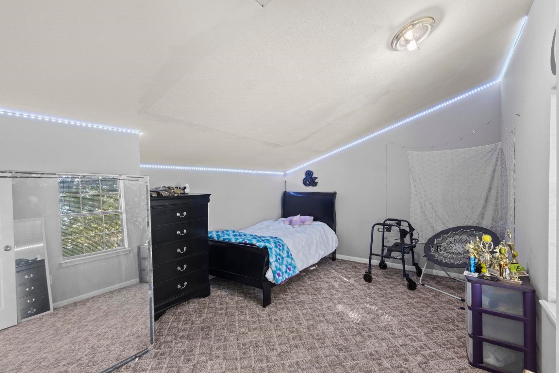 770 Katherene Avenue Bridge City, TX 77611 - Photo 22 of 29 a bedroom with bed and window
