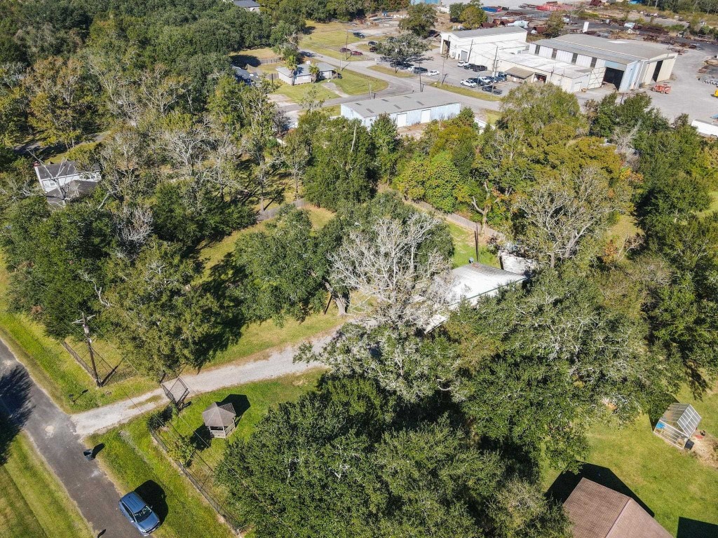 770 Katherene Avenue Bridge City, TX 77611 - Photo 29 of 29 an aerial view of residential house with outdoor space and trees all around