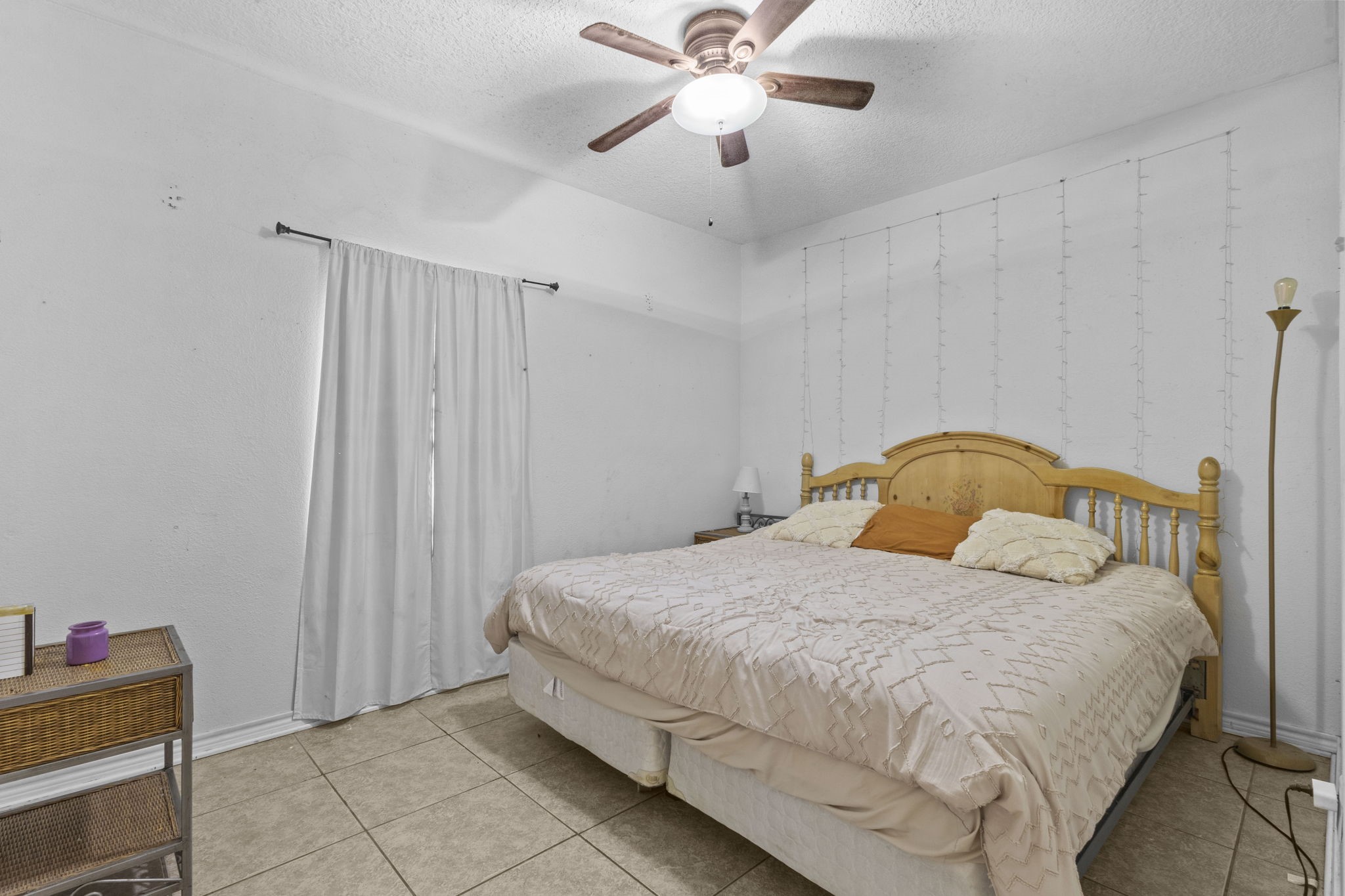 770 Katherene Avenue Bridge City, TX 77611 - Photo 5 of 29 a bedroom with a bed and a chandelier fan