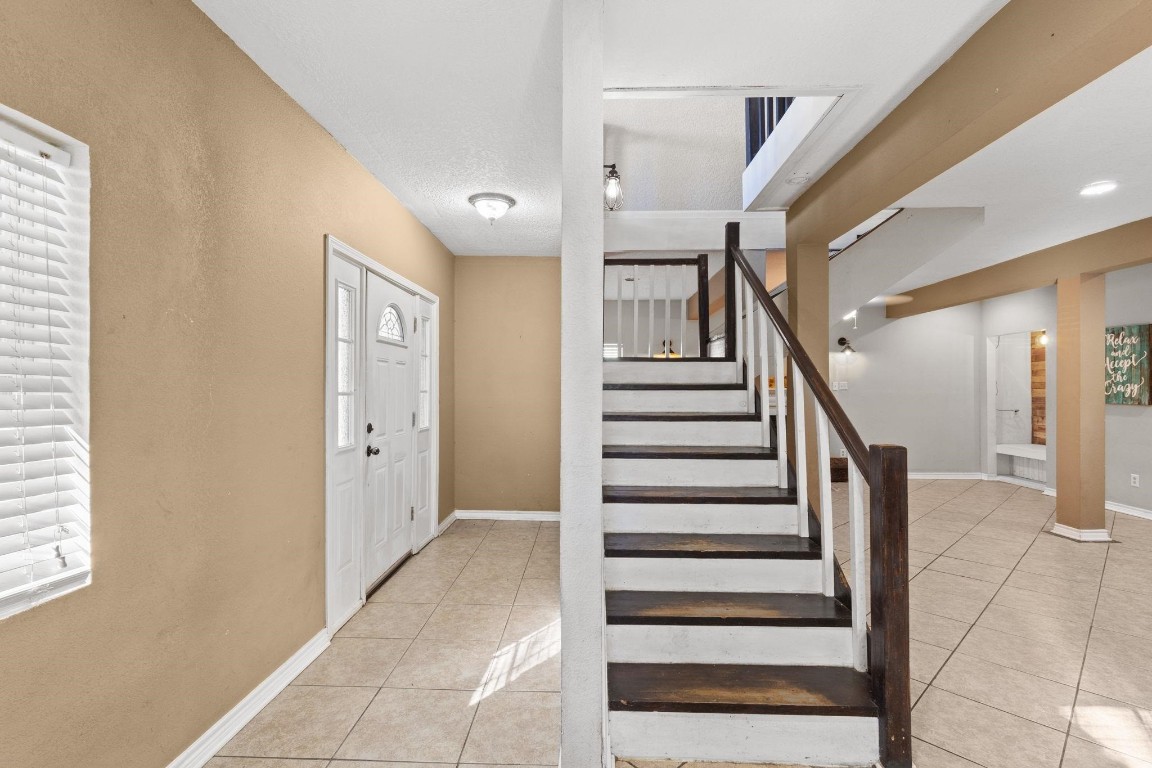 770 Katherene Avenue Bridge City, TX 77611 - Photo 5 of 29 a view of entryway with furniture and stairs
