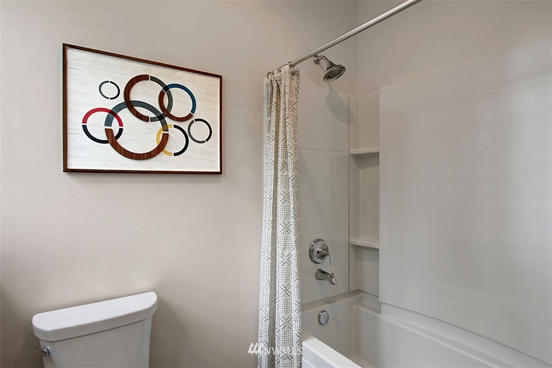 34 232nd Place Southeast Bothell, WA 98021 - Photo 22 of 26 a bathroom with a toilet and a shower