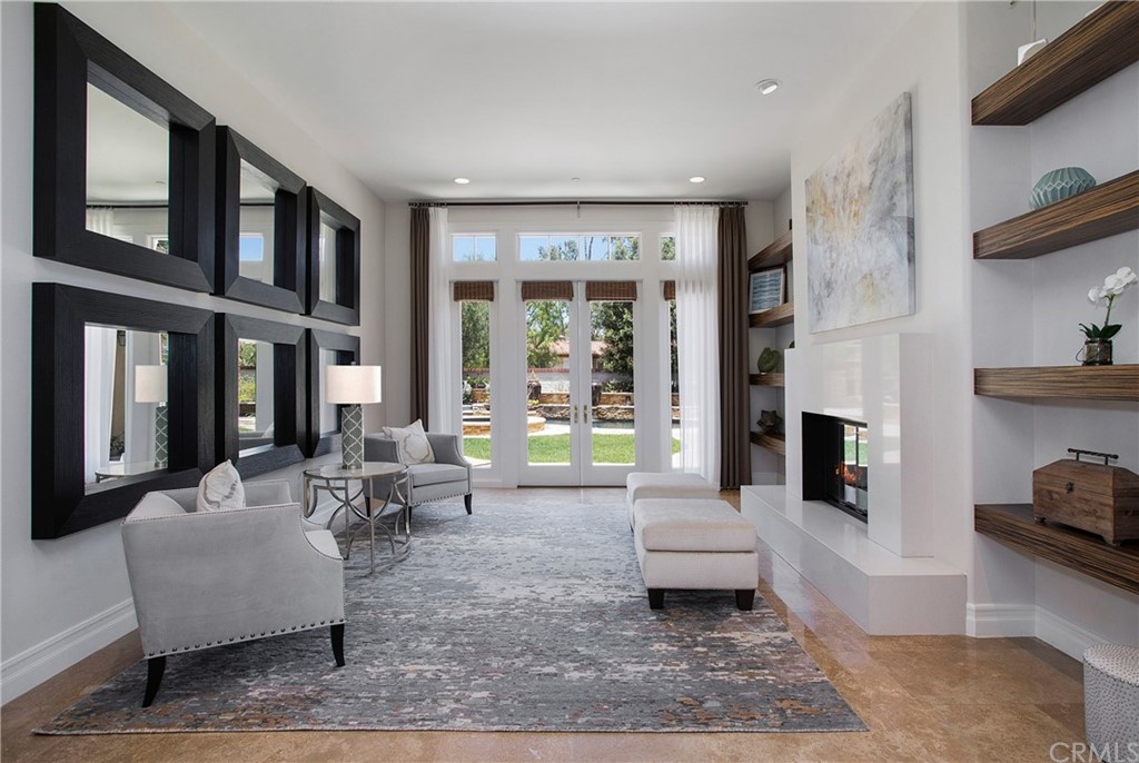 2395 Horizon Way Tustin, CA 92782 - Photo 12 of 39 a living room with furniture and a fireplace