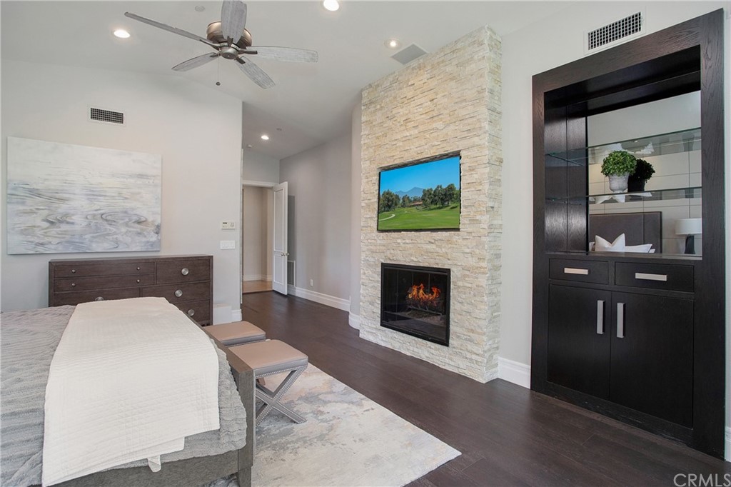 2395 Horizon Way Tustin, CA 92782 - Photo 15 of 39 a living room with furniture and a fireplace